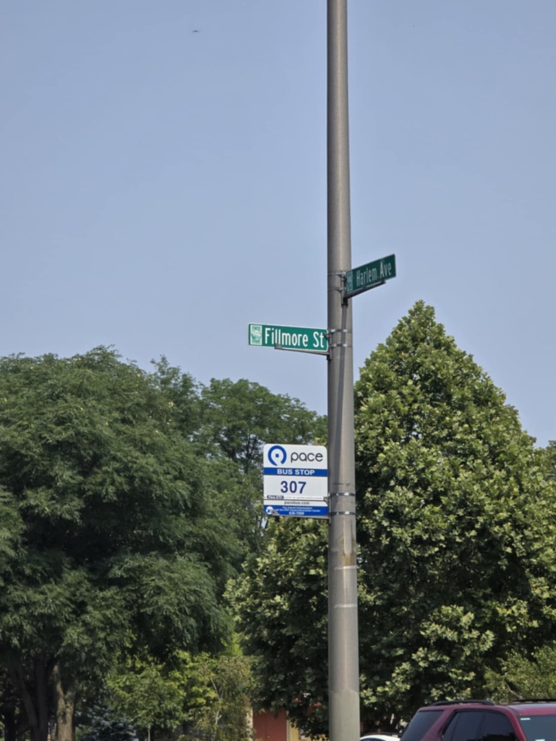 1101 Harlem Avenue, Unit 203 Oak Park, IL 60130 - Photo 34 of 58 a sign that is on a pole
