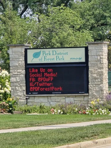 a view of a field and basketball court