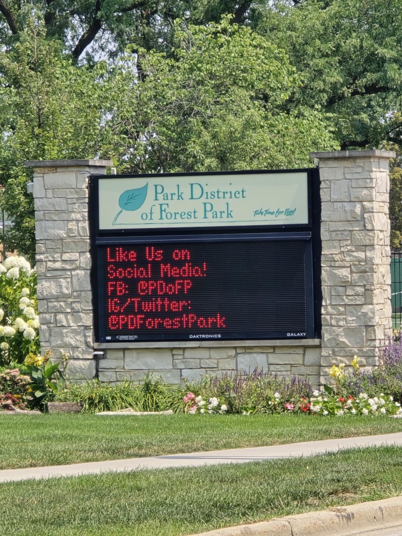 1101 Harlem Avenue, Unit 203 Oak Park, IL 60130 - Photo 36 of 58 a sign that is on the side of a building