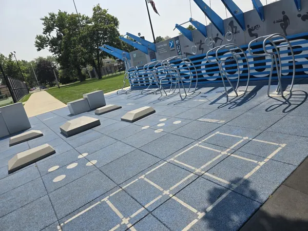 a view of a car is parked on the side of the road