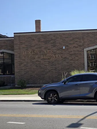 a sign in front of a building