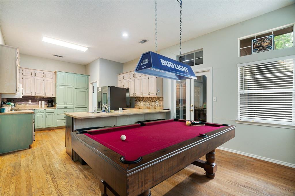 455 Timber Lakes Drive Powderly, TX 75473 - Photo 5 of 18 a room with pool table and windows