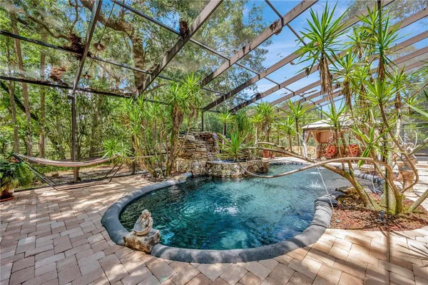 a view of backyard with green space