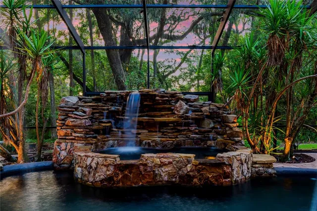 a backyard of a house with lots of green space