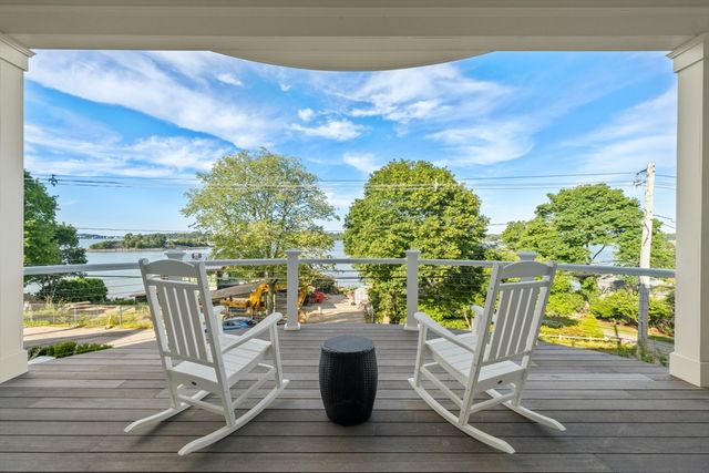 a view of a porch with seating space