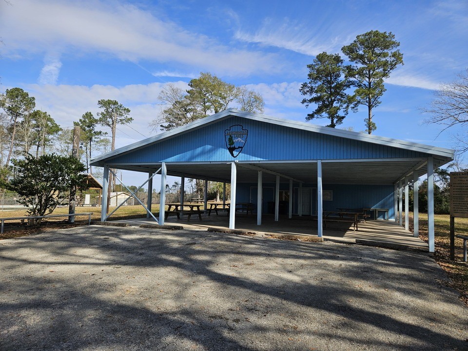 0 Coaltown Road Willis, TX 77378 - Photo 27 of 27 a couple of table and chairs under an umbrella
