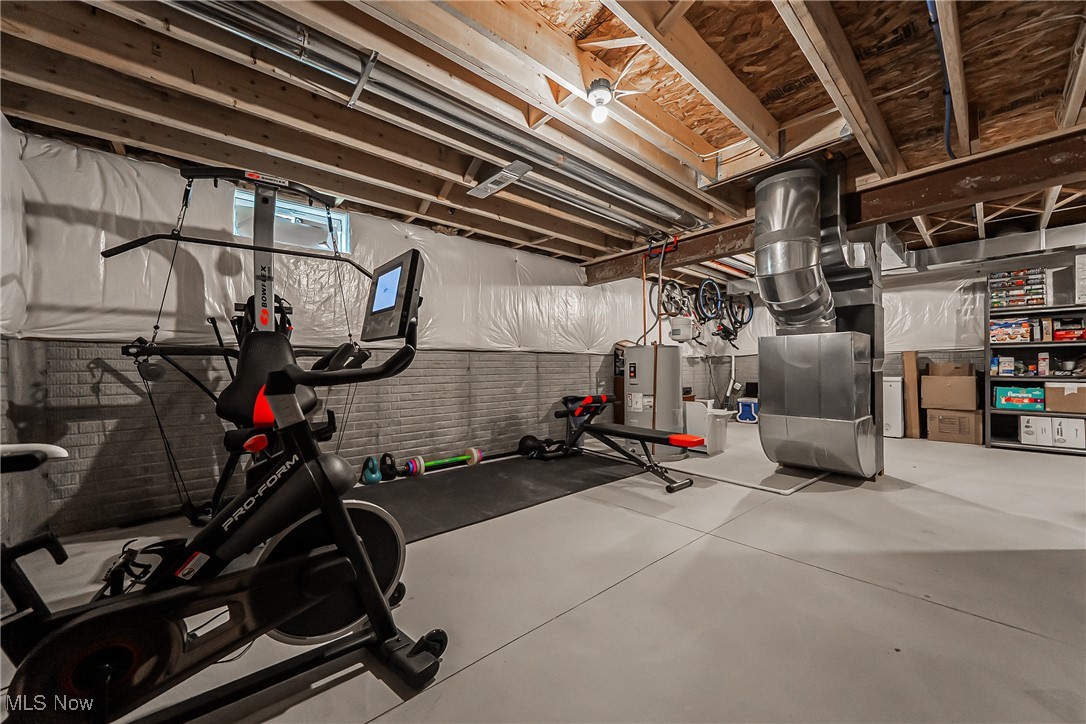 6105 Dunham Road Maple Heights, OH 44137 - Photo 29 of 38 Exercise room with electric water heater and heating unit