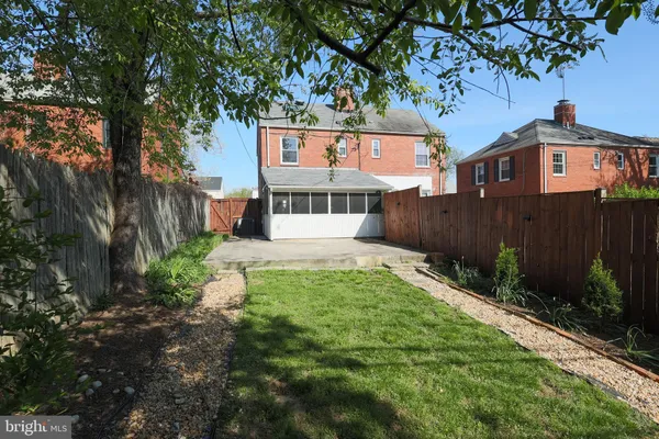 a sign on a pole on a street