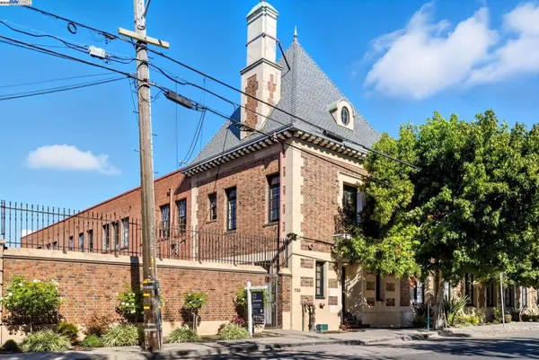 a front view of a building with street view