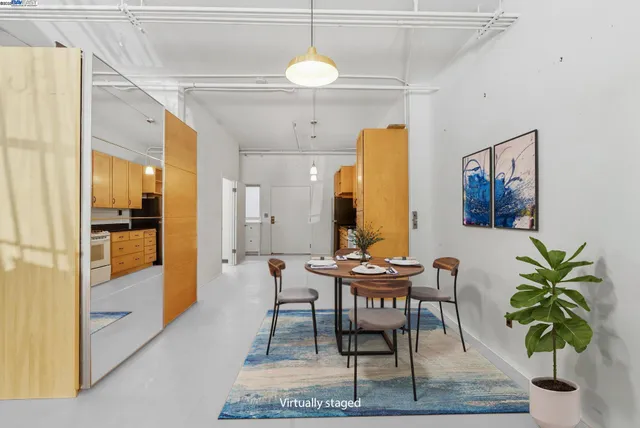 a workspace with furniture and a potted plant