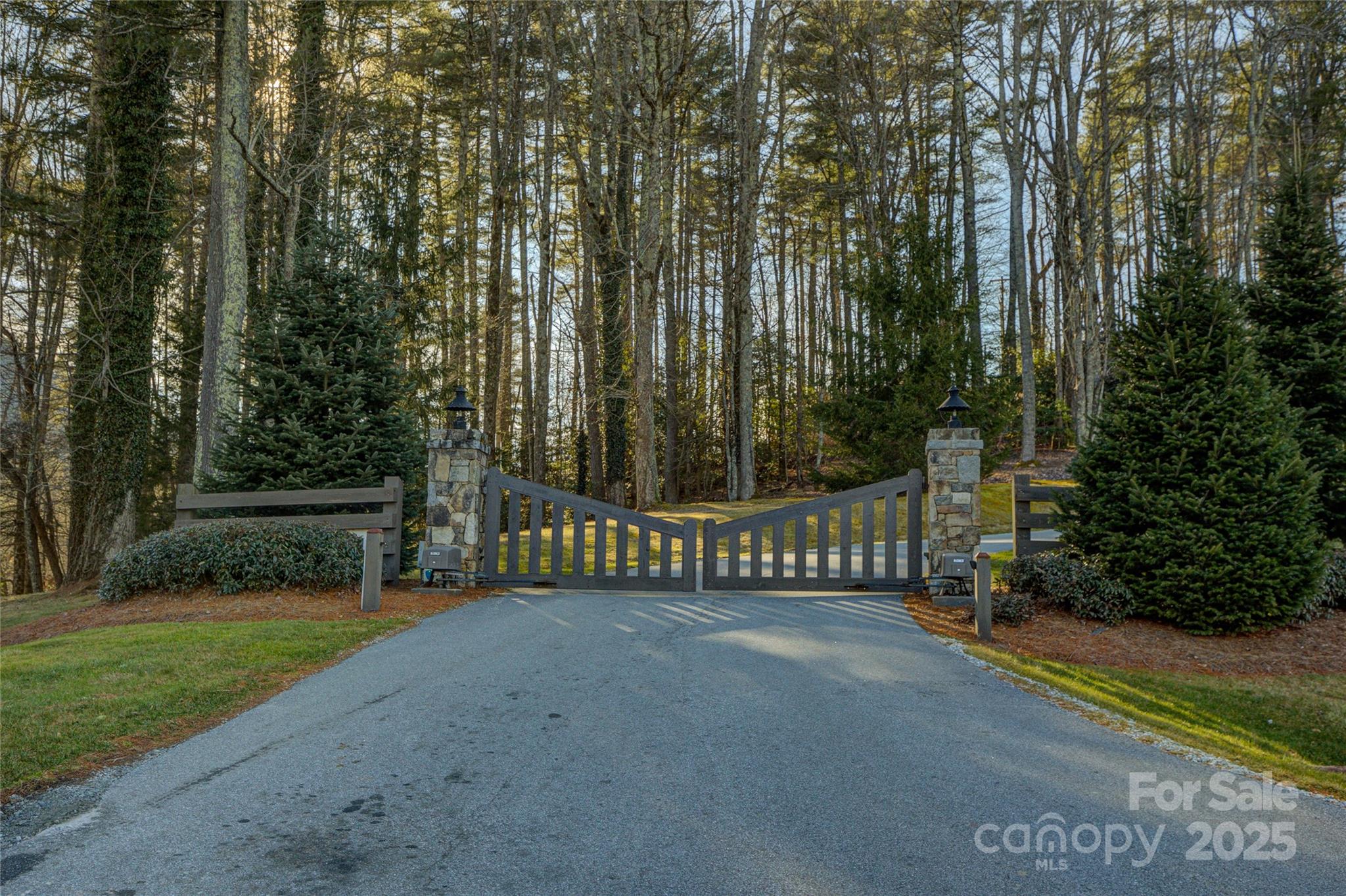 135 Lonesome Valley Road Sapphire, NC 28774 - Photo 2 of 46 a view of a park with large trees