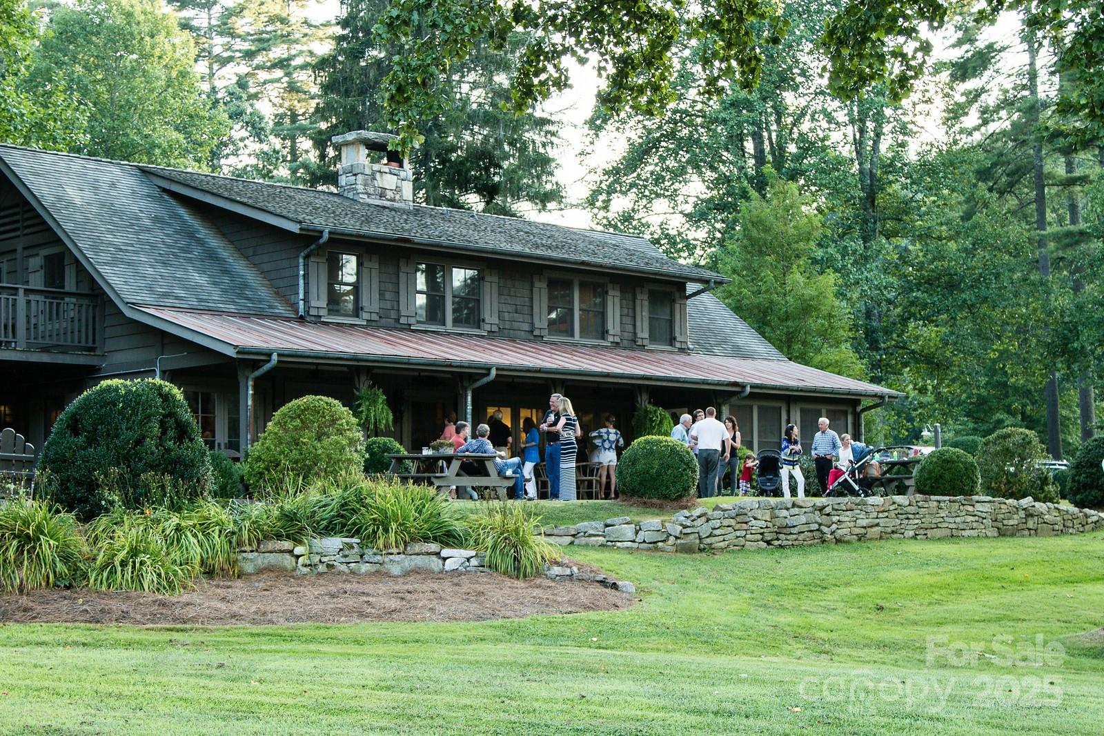135 Lonesome Valley Road Sapphire, NC 28774 - Photo 46 of 46 a front view of a house with garden