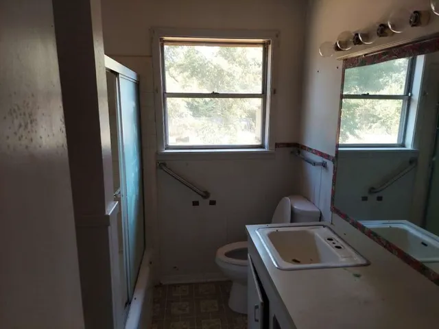 a room with storage and window