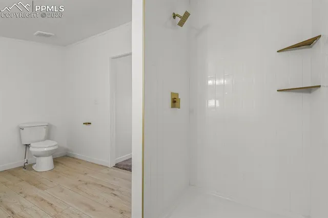 a bathroom with a toilet