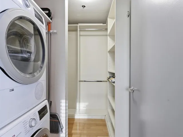 a close view of a utility room with dryer and washer
