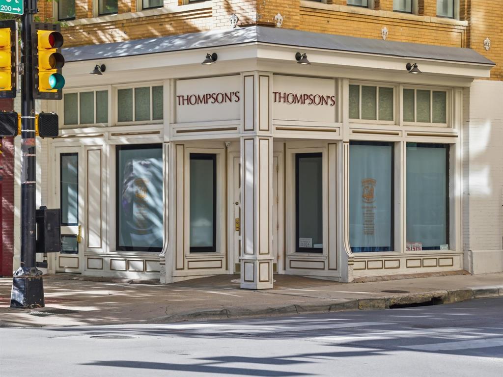 910 Houston Street, Unit 305 Fort Worth, TX 76102 - Photo 21 of 22 a view of a building with a entrance door