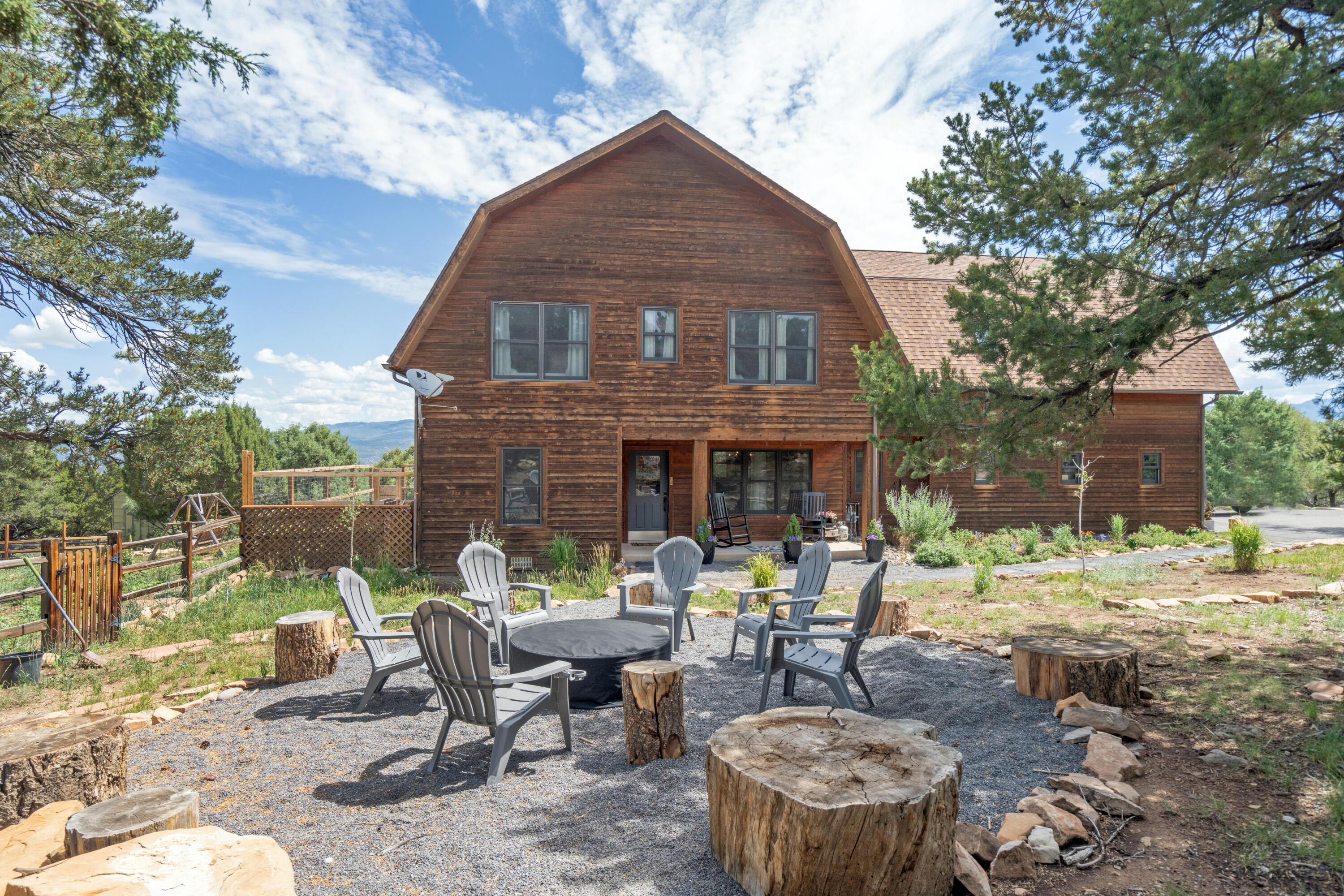 787 Pine Drive Ridgway, CO 81432 - Photo 35 of 42 a patio with table and chairs and potted plants