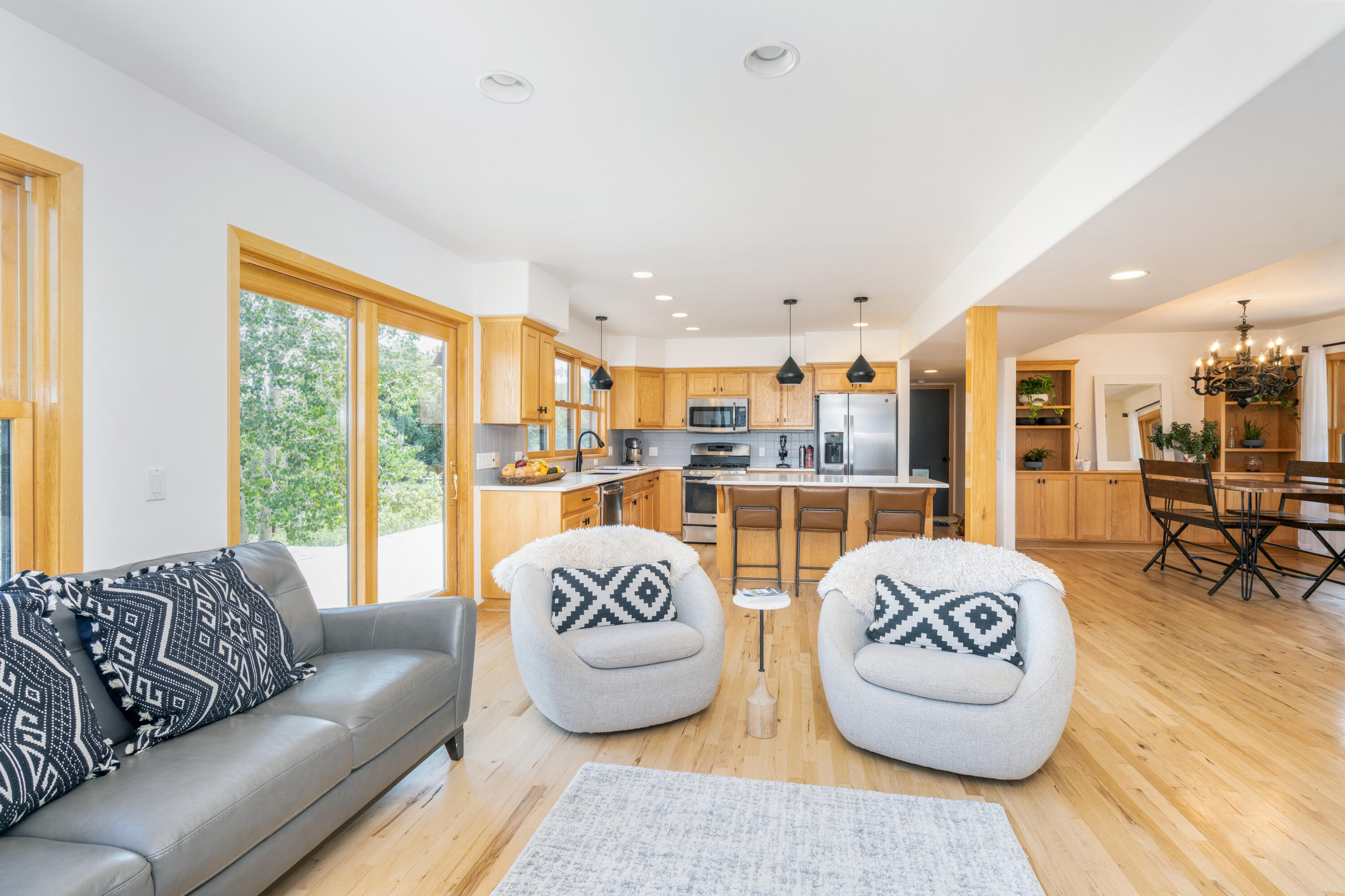 787 Pine Drive Ridgway, CO 81432 - Photo 5 of 42 a living room with furniture and a large window