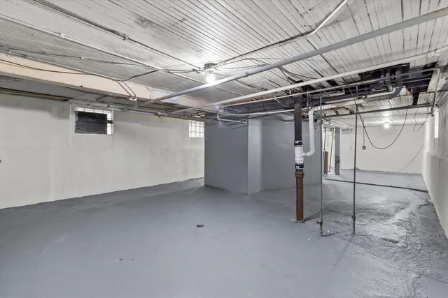 a view of a room with wooden walls