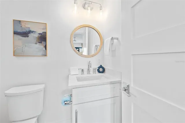 an outdoor space with lots of tables and chairs