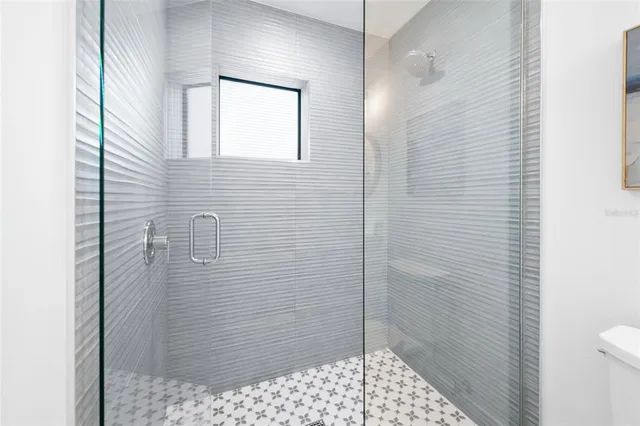 an outdoor space with pool and furniture