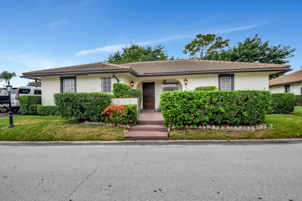 $450,000 | 428 Pine Villa Drive, Atlantis, FL 33462