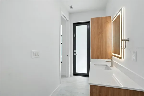 a view of small space with wooden floor