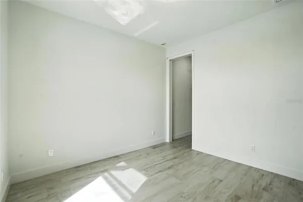a view of a terrace with glass door