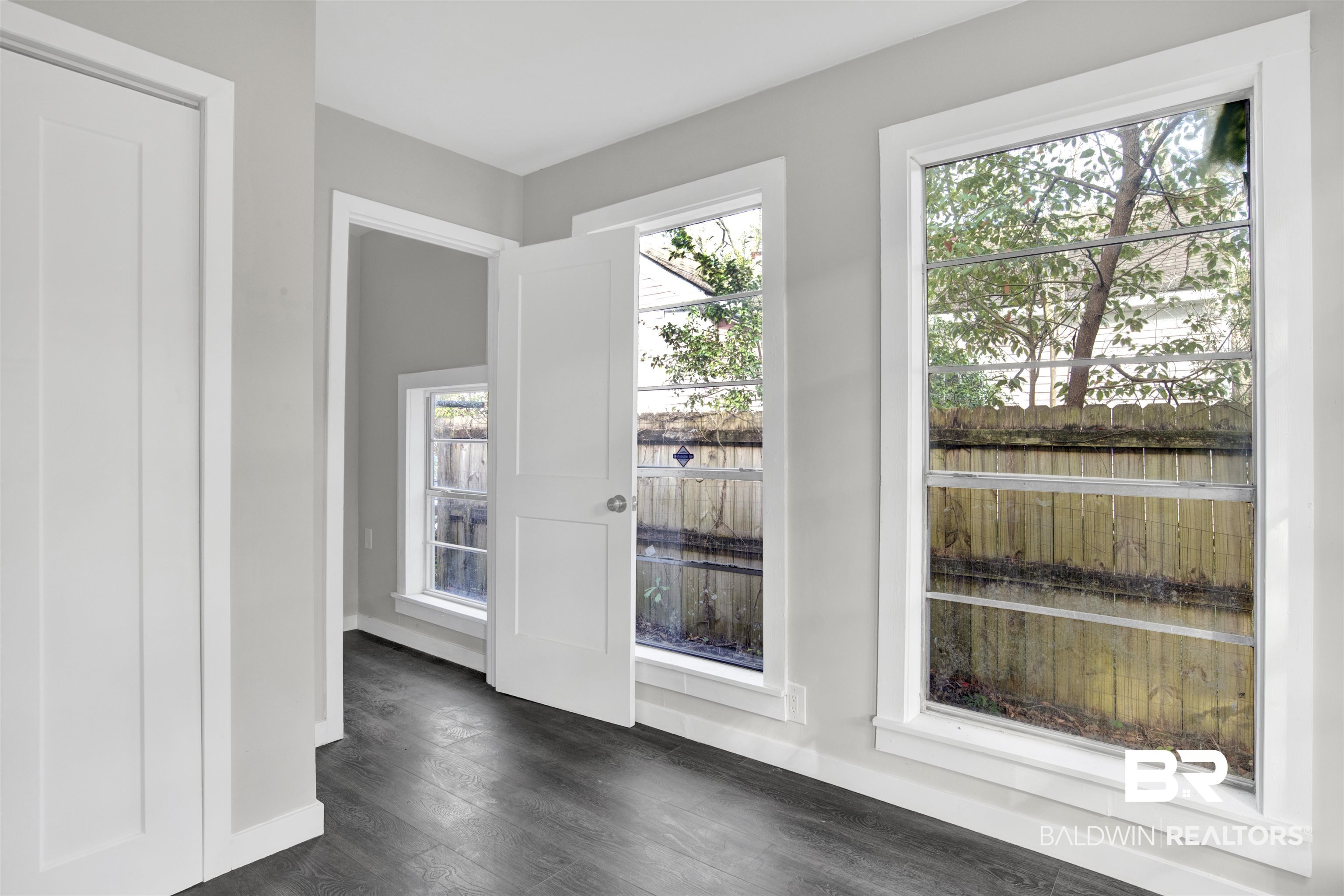 1063 Selma Street Mobile, AL 36604 - Photo 20 of 32 Entryway featuring wood finished floors and baseboards