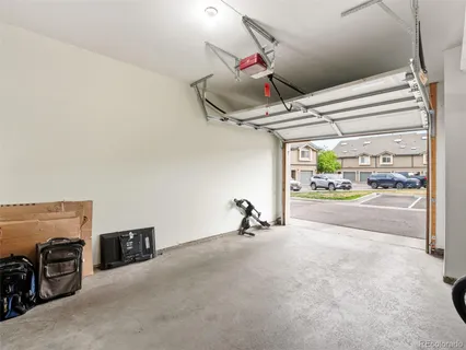 a view of a livingroom with an empty space and a window