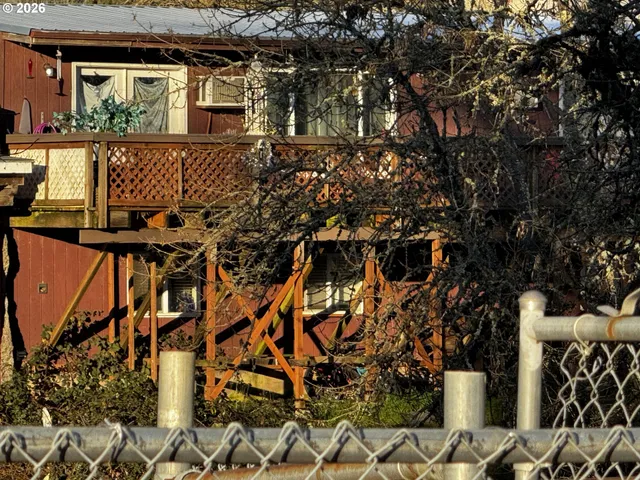 a black and white photo of a house