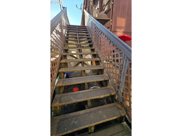 a black and white photo of a living room