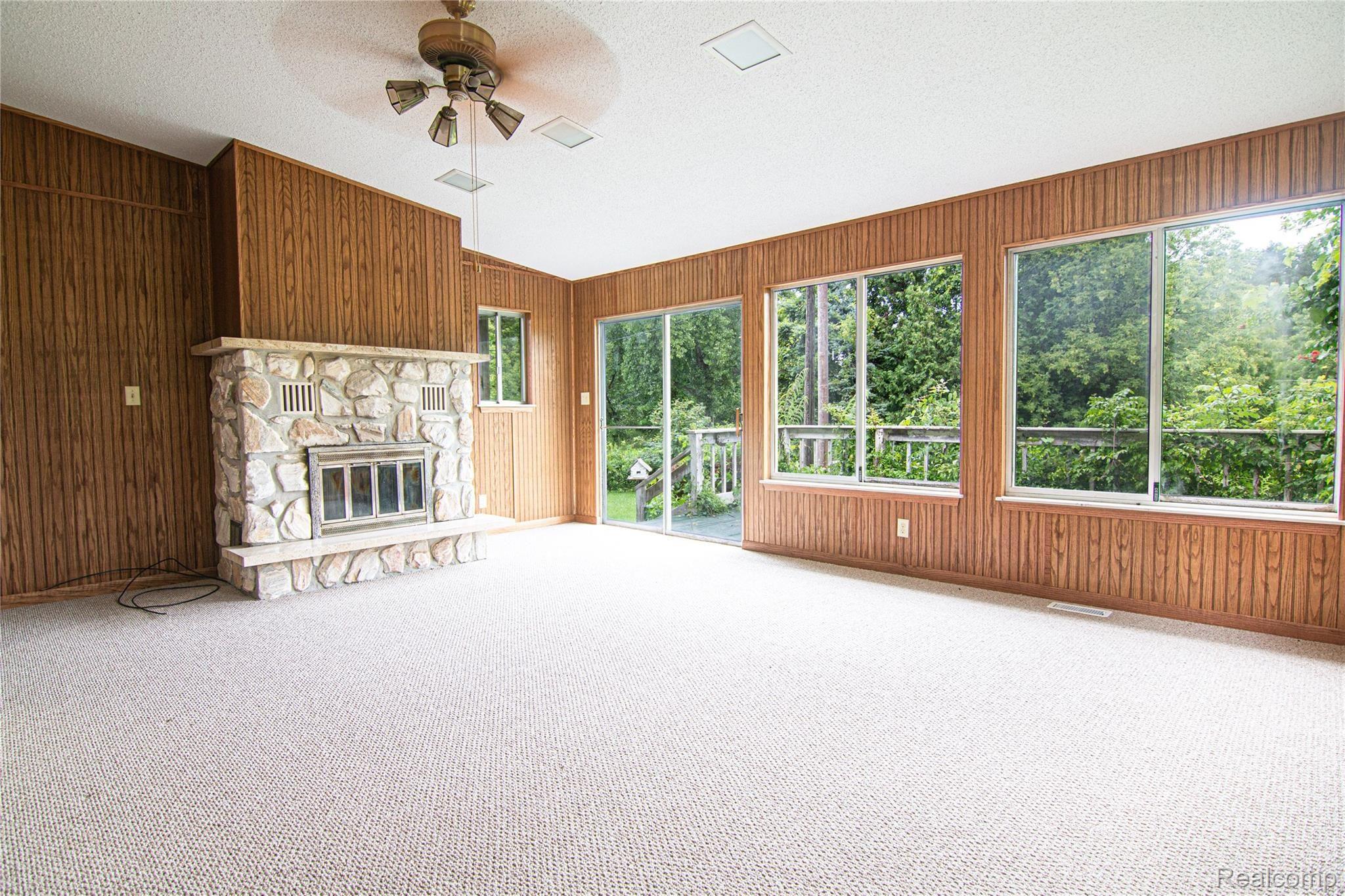13532 Tuscola Road Clio, MI 48420 - Photo 6 of 17 13532 Tuscola Rd Clio (Livingroom 2 with Fire Place) (1).jpg