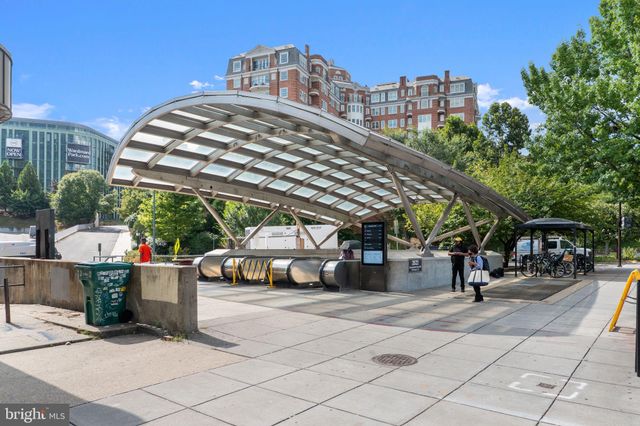 a front view of a building with garden
