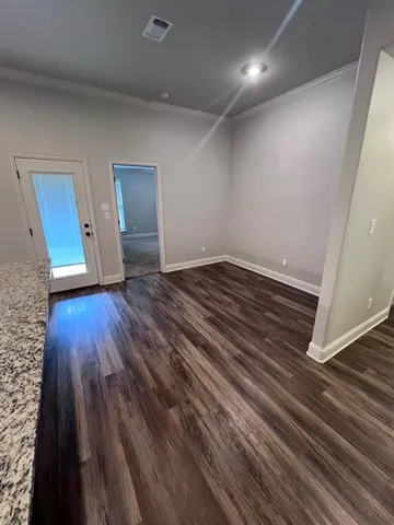 a kitchen with a stove microwave and refrigerator