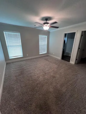 a view of an empty walk in closet