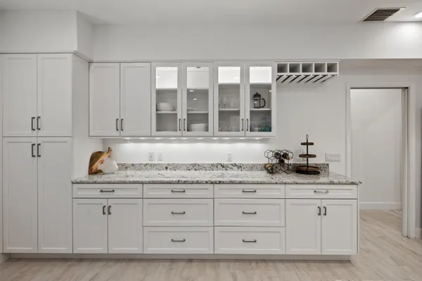 a view of cabinets with granite countertop cabinets