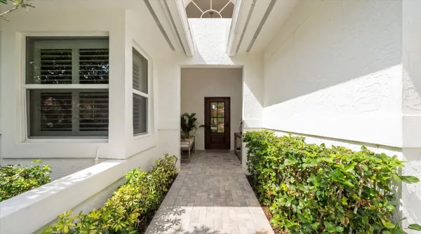 a view of a back yard from a balcony