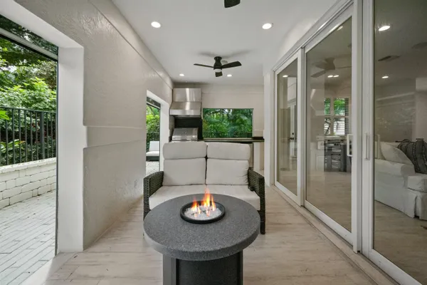 a living room with furniture and a table