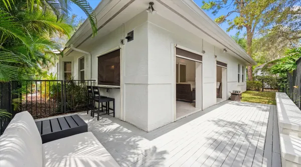 a view of balcony with furniture