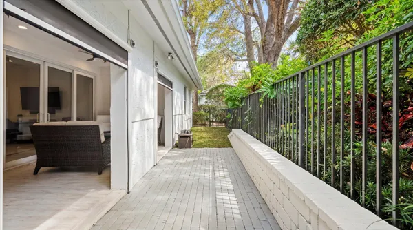 a view of balcony with furniture