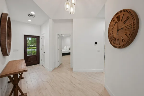 a view of a livingroom with furniture and window