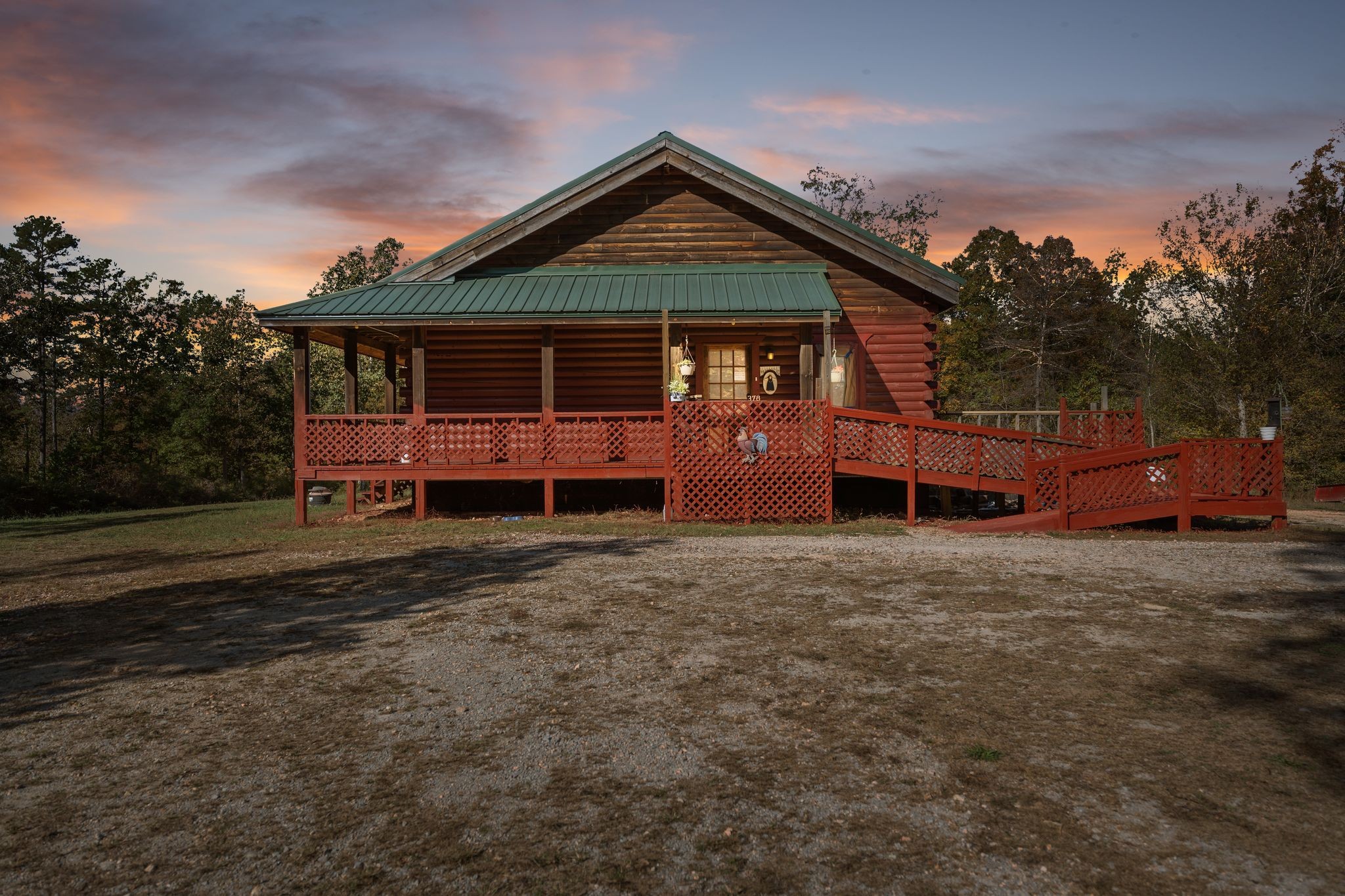 302 Faith Way Waynesboro, TN 38485 - Photo 1 of 99 a front view of a house with a garden