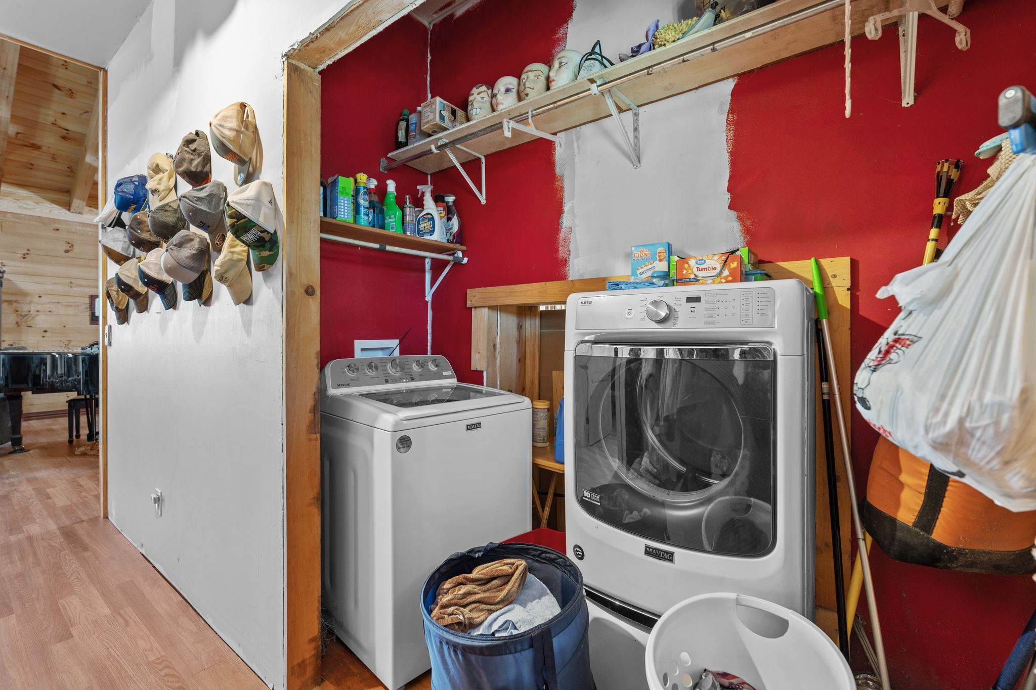 302 Faith Way Waynesboro, TN 38485 - Photo 18 of 99 a utility room with dryer washer and a view of living room