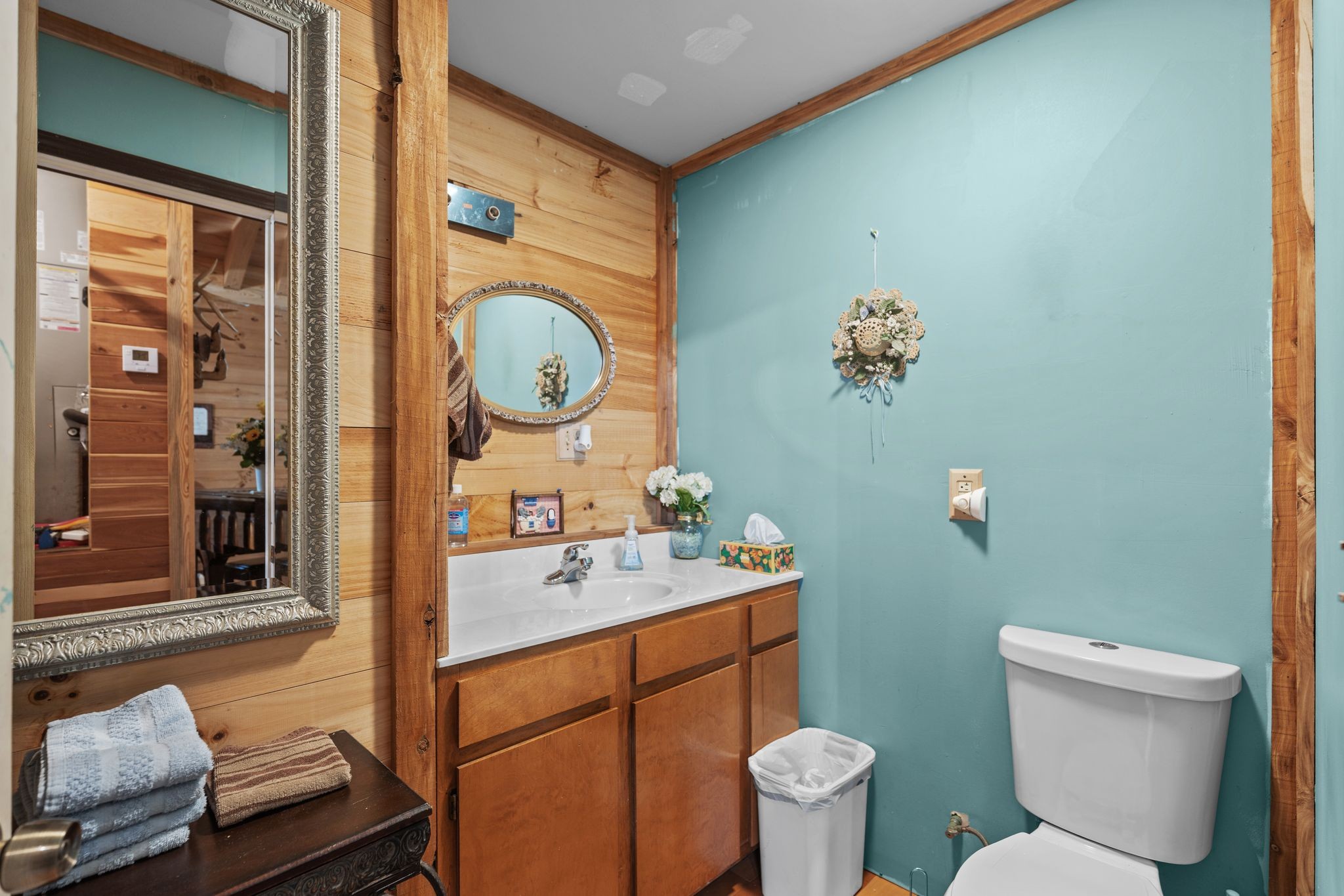 302 Faith Way Waynesboro, TN 38485 - Photo 19 of 99 a bathroom with a sink mirror vanity and toilet
