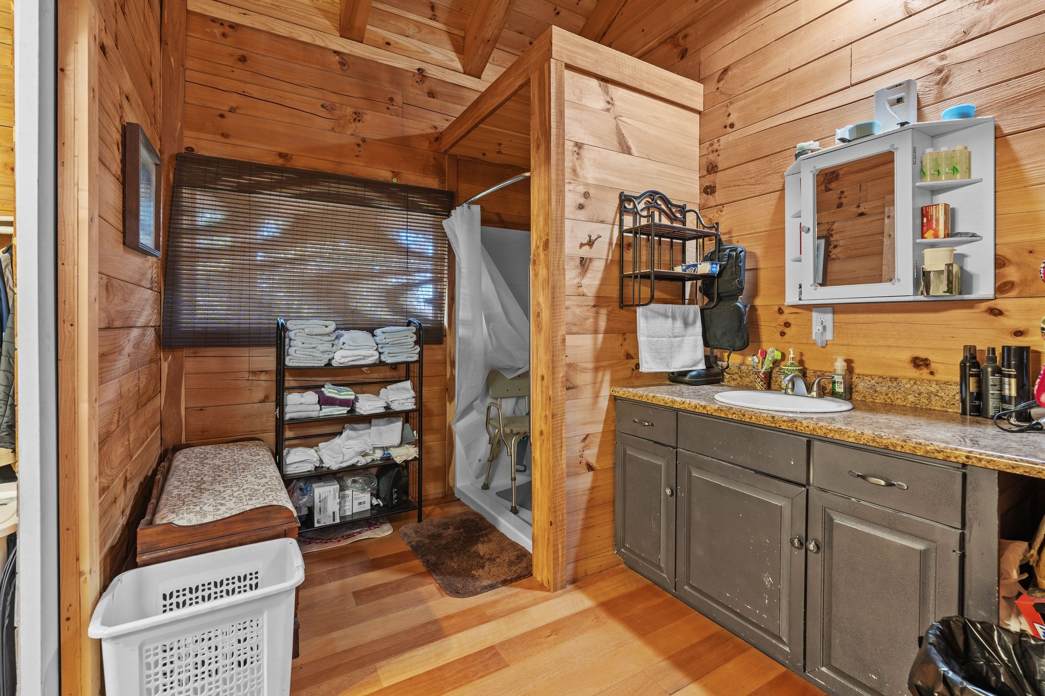 302 Faith Way Waynesboro, TN 38485 - Photo 24 of 99 a bathroom with a sink and a mirror