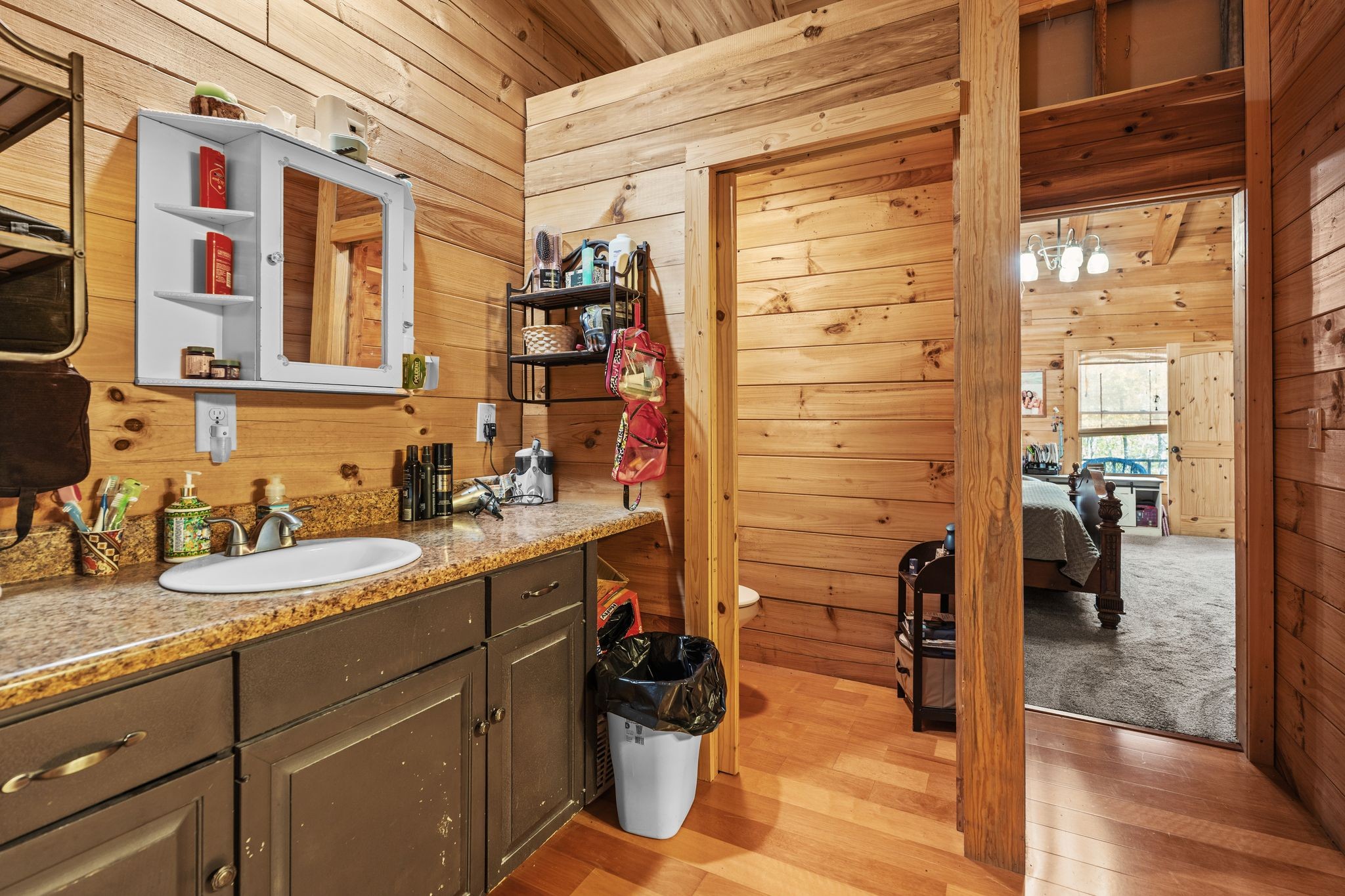 302 Faith Way Waynesboro, TN 38485 - Photo 25 of 99 a bathroom with a sink and a mirror