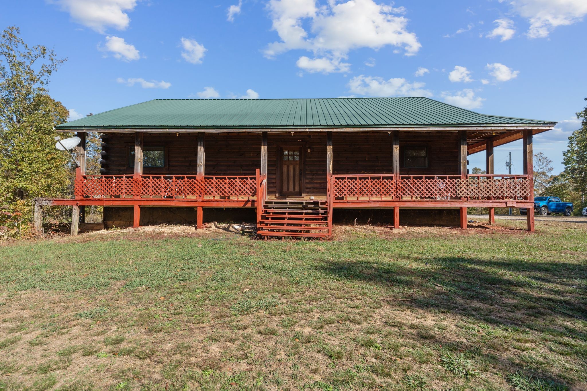 302 Faith Way Waynesboro, TN 38485 - Photo 4 of 99 a front view of a house with a yard