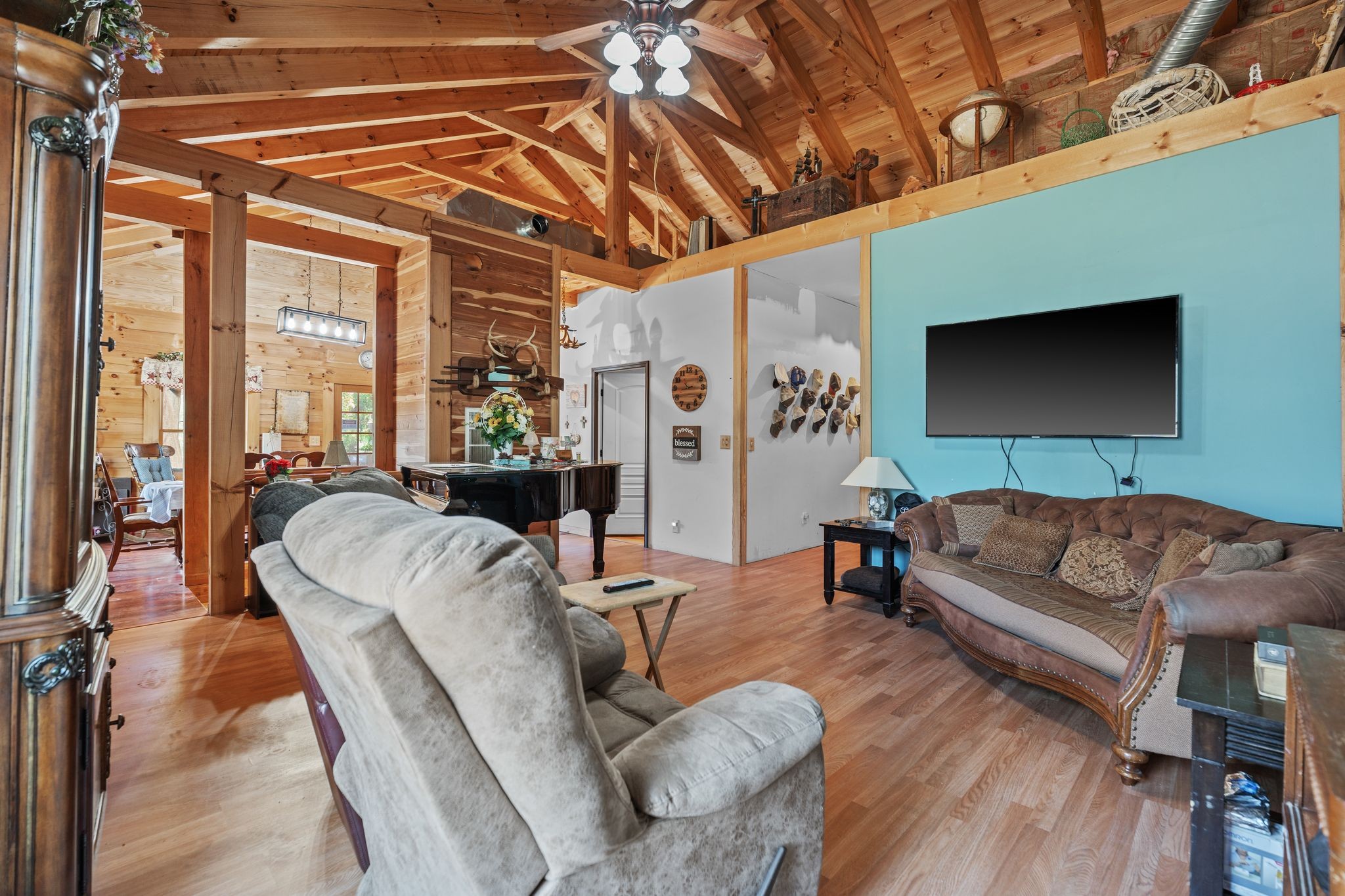 302 Faith Way Waynesboro, TN 38485 - Photo 7 of 99 a living room with furniture and a flat screen tv