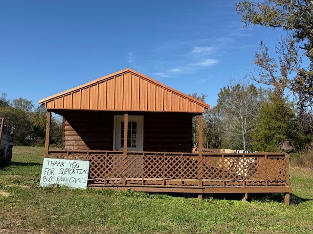 302 Faith Way Waynesboro, TN 38485 - Photo 87 of 99 a front view of a house with a yard
